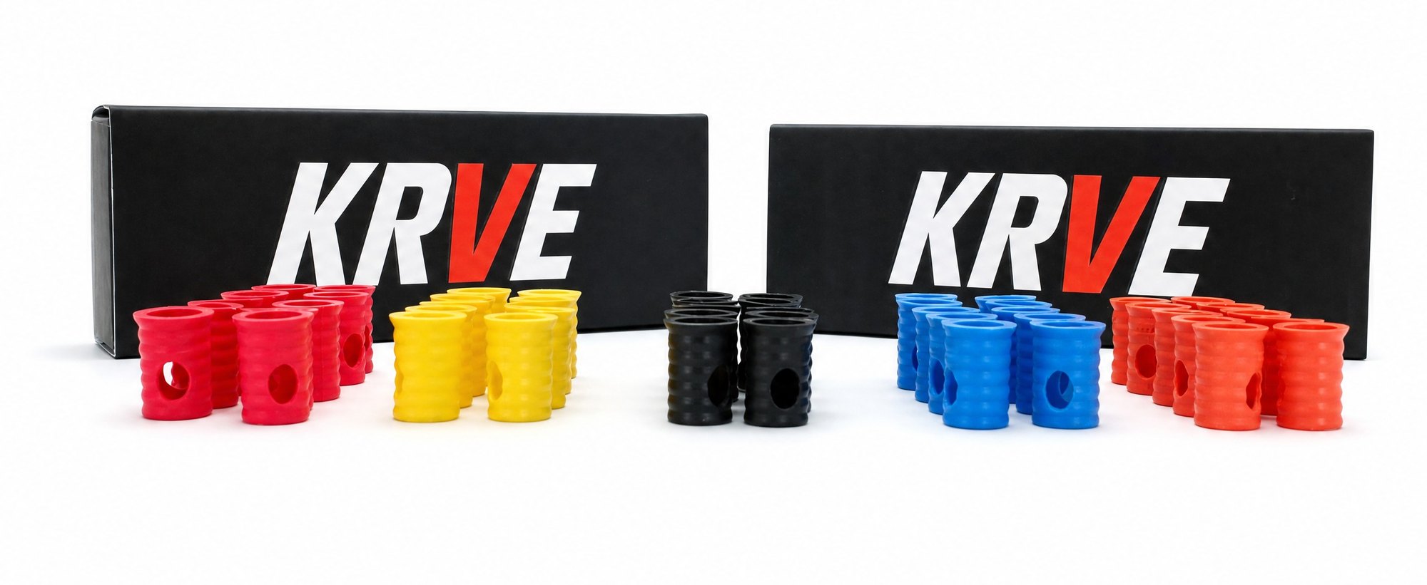 KRVE parts grouped by color (red, yellow, black, blue and orange) beside two KRVE boxes